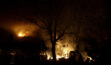 Wildfires kill 15, destroy 1,500 homes and other buildings in California