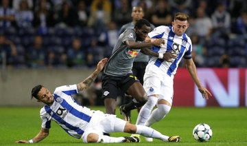 Porto beats Leipzig 3-1 to move 2nd in CL group