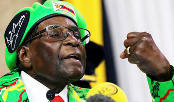 Mugabe threatens to sack VP as wife booed at rally