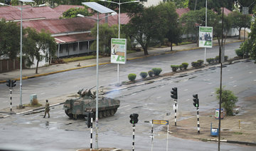 Zimbabwe army has Mugabe and wife in custody, secures capital