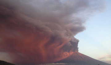 Dozens of flights canceled as Bali volcano continues to spew smoke