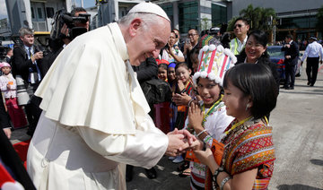 Pope arrives in Myanmar on high-stakes visit