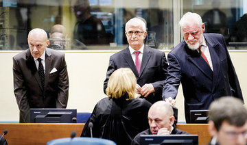 Chaos at UN court as Bosnian Croat defendant ‘takes poison’