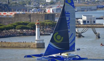 Frenchman smashes record for non-stop solo sailing around the world