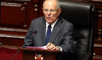 Peru president defeats bid to oust him by 8 votes in Congress