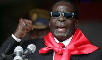 Former Zimbabwe ministers loyal to Mugabe charged with corruption