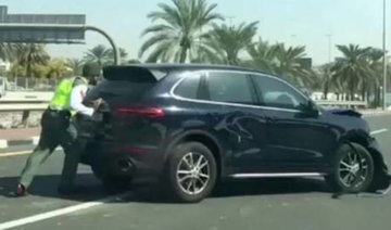 Video: Dubai police officer pushes car off road to avoid more accidents