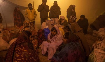 Millions of Hindu devotees gather to ‘purify souls’ in Magh Mela festival