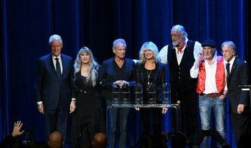 Bill Clinton repays a favor to Fleetwood Mac at MusiCares ceremony