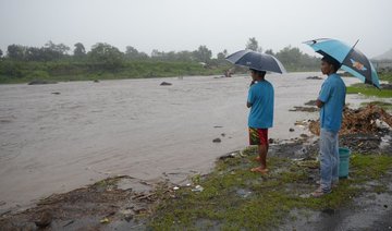 Deadly mudflows threaten residents near erupting Philippine volcano