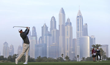 Rory McIlroy hot in late stages of 2nd round to take Dubai lead