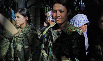 Syrian Kurds mourn female fighter shown mutilated in video