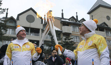 In cold, poor South Korean mountains, Winter Olympics begin