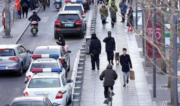 Woman killed, 12 injured in Beijing mall knife attack