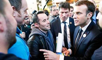 Macron faces grilling from farmers at agricultural fair