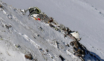 Rescue teams recover black boxes at site of Iran plane crash