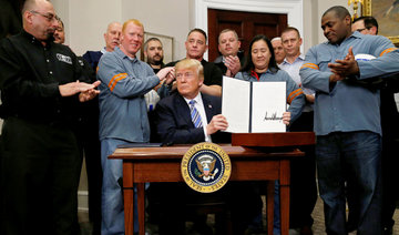 Trump orders stiff trade tariffs, unswayed by grim warnings