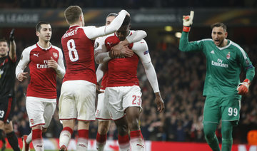 Welbeck double helps Arsenal past Milan, Dortmund dumped out