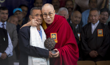 Dalai Lama calls on Tibetans to remain united as India drifts toward China