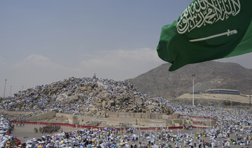 Muslim pilgrims gather at top of the rocky hill known as the Mountain of Mercy, on the Plain of Arafat, Saudi Arabia. (AP)