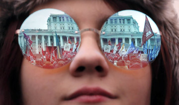 Woman attends an opposition rally in Moscow, Russia 17 March 2019. 