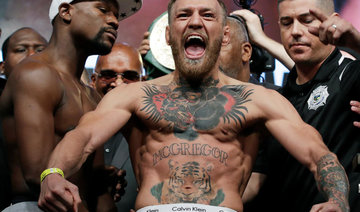 UFC star Conor McGregor turns self into police after backstage scuffle