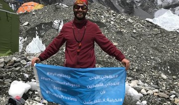 Palestinian refugee-amputee climbs Mount Everest to save UNRWA school