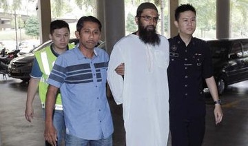 Malaysia convicts first person under fake news law