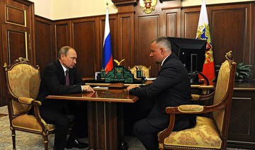 Putin promotes ex-bodyguard to new cabinet