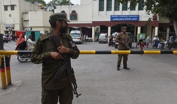 Gunmen kill official, wound 3 guards in Pakistan tribal area
