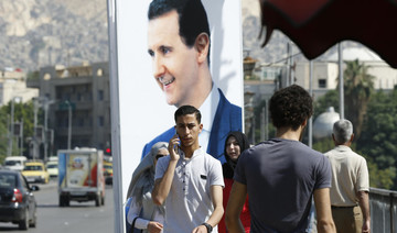 Syria’s Assad says will visit North Korea, news agency reports