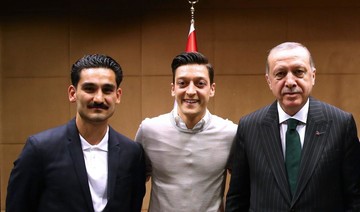 Ozil defends controversial picture with Erdogan