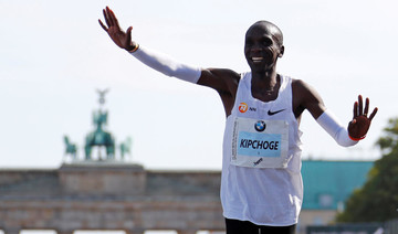 Kenya’s Eliud Kipchoge breaks marathon world record in Berlin