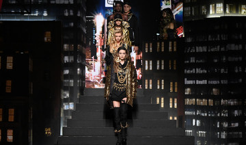 Hadid sisters walk in the Moschino x H&M fashion show