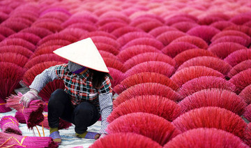 Vietnam’s ‘incense village’ blazes pink ahead of lunar new year