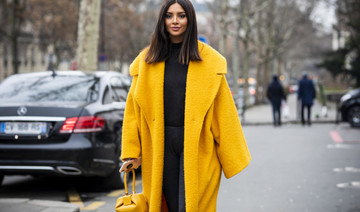 Lebanese blogger Nathalie Fanj braves the snow for her fashion fix in Paris