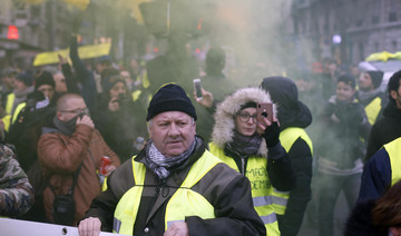 ‘Yellow vests’ back on France’s streets to challenge Macron