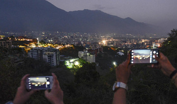 Venezuela’s Guaido calls for massive protest as blackout drags on