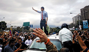 Guaido vows to oust Maduro as thousands of Venezuelans protest