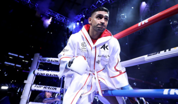 British-Pakistani Amir Khan wins WBC welterweight title against Billy Dib in Jeddah