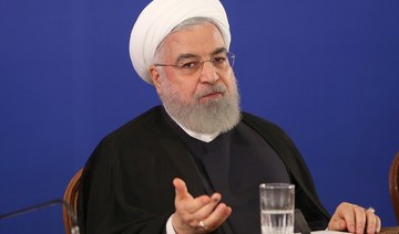 Rouhani says Iran favors talks but US must lift sanctions