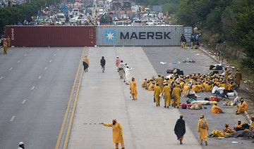 Pakistani businesses fear recession as anti-government protest continues 