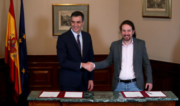 Spain’s Socialists and Podemos reach preliminary coalition deal