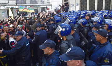 Thousands hit streets of Algiers on protest movement anniversary