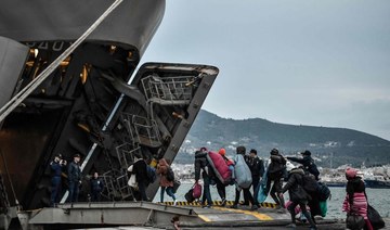 Greek navy ship on Lesbos houses latest island migrants