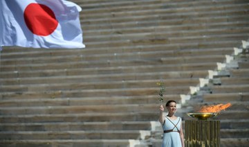 Olympics-Tokyo 2020 Games organizers receive Olympic flame