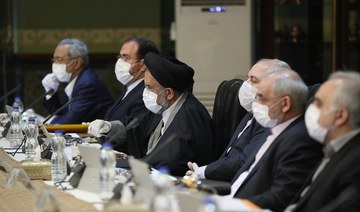 Iranian lawmakers refuse to be quarantined in parliament building