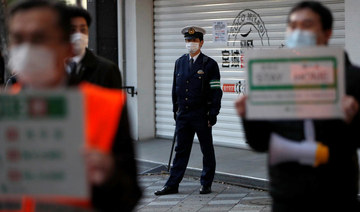 Japan urges citizens to isolate as reports warn of 400,000 deaths