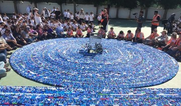 Saudi school smashes world record for longest chain of bottle caps