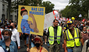 France says ‘merci’ to virus heroes on poignant Bastille Day